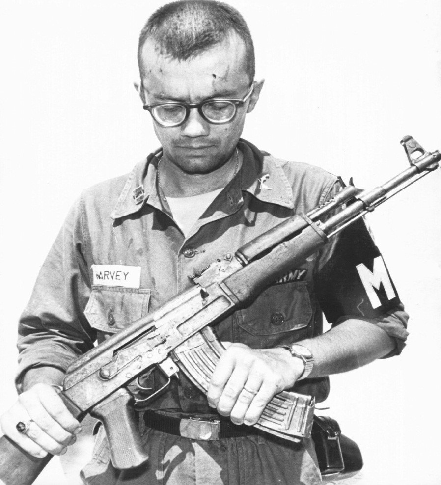 Photo of US military policeman with a Kalashnikov assault rifle